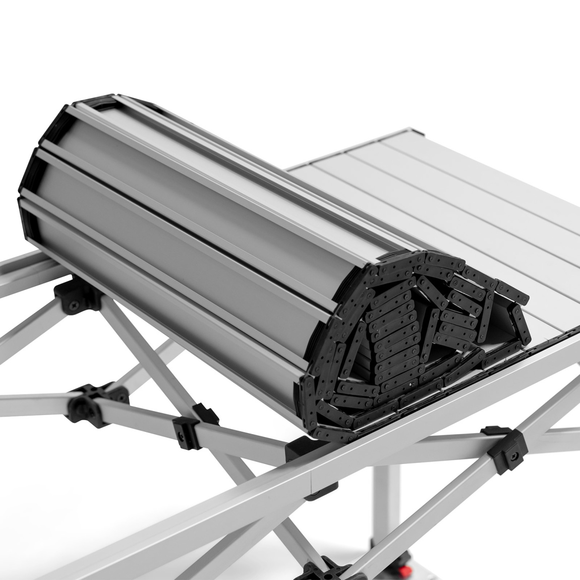 Transport peu encombrant grâce au plateau de table enroulable